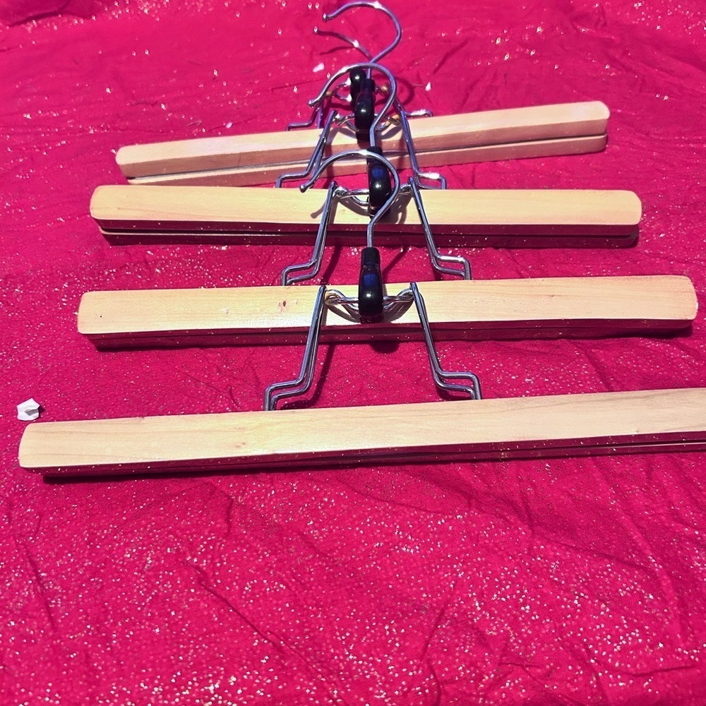 Four Wooden Pants Hangers with Metal Clips